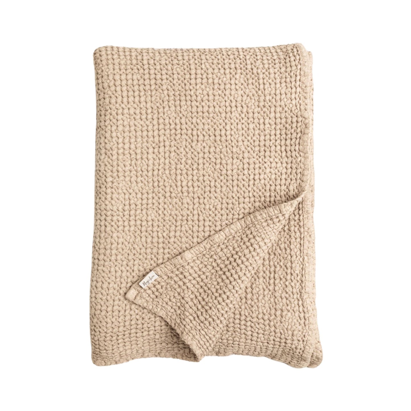 Beige pledd i lin og bomull til sofa, vaffelvevd og mykt for et sunt og bærekraftig hjem