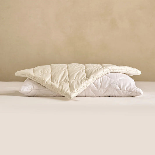 Putebeskytter i bomull og ull – beskytter puten og gir et sunnere sovemiljø