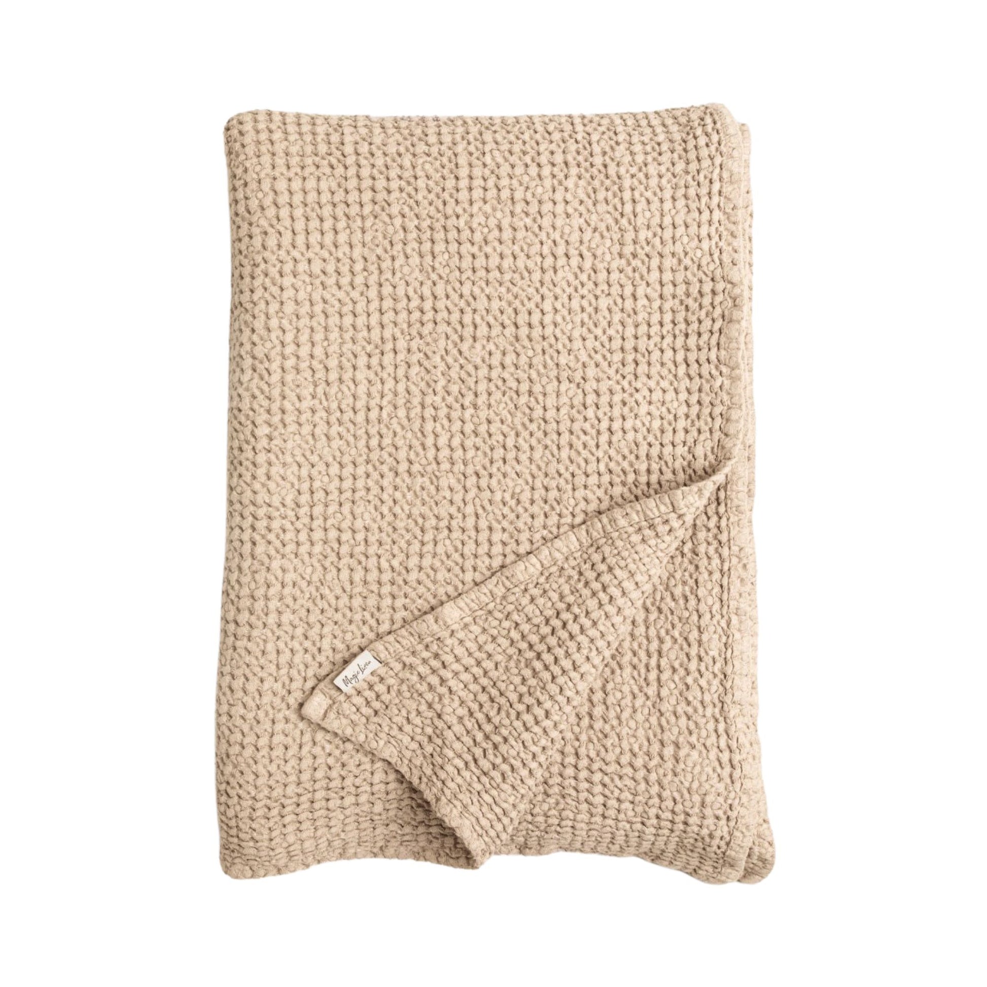 Beige pledd i lin og bomull til sofa, vaffelvevd og mykt for et sunt og bærekraftig hjem