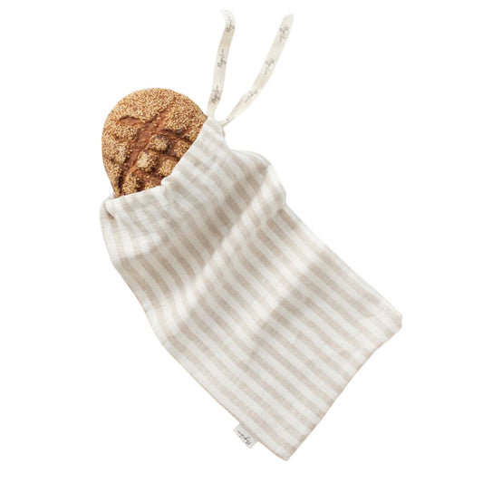 Gjenbrukbar brødpose i beige stripet lin – plastfritt alternativ til oppbevaring av brød