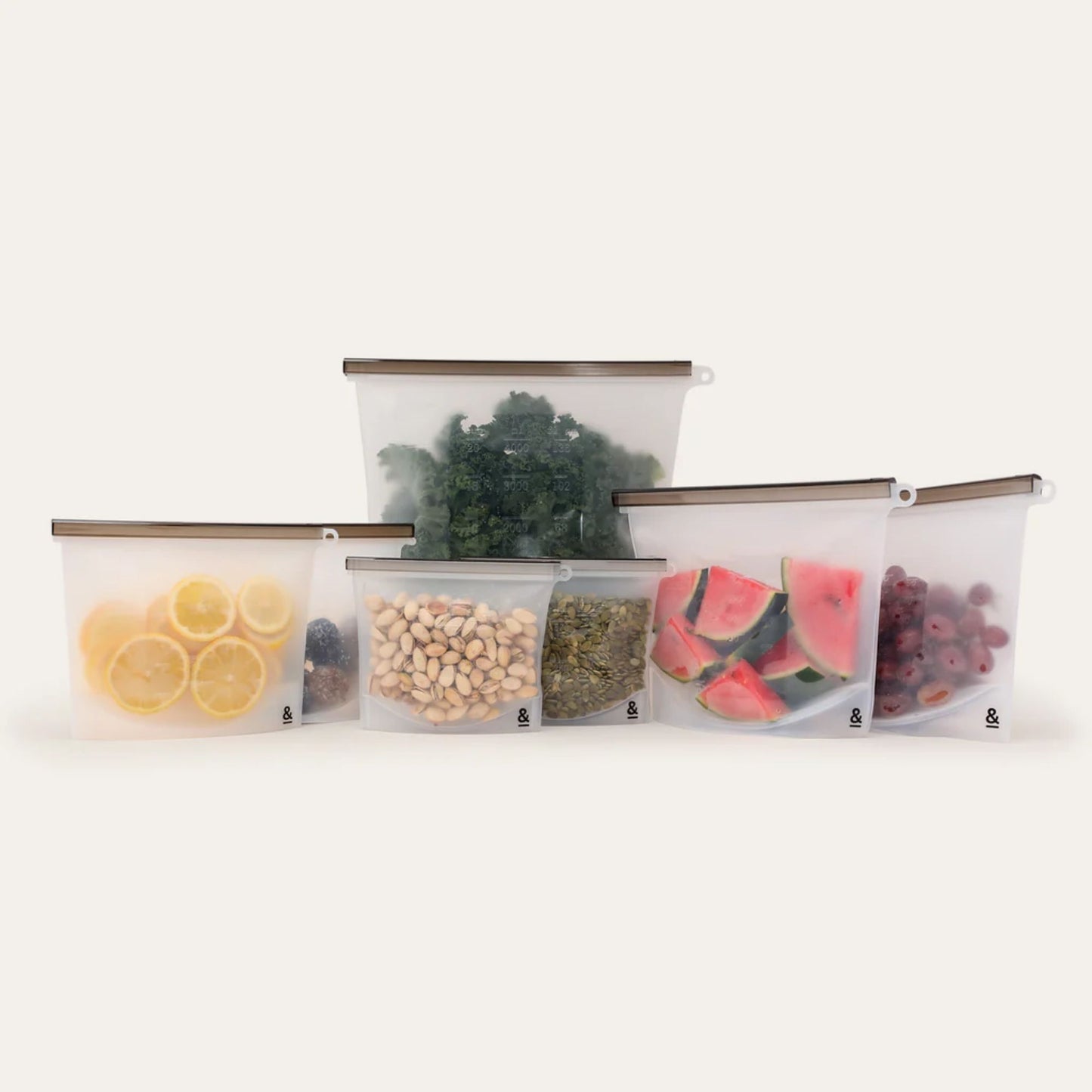 Syv gjenbrukbare silikonposer i fire størrelser fra Seed & Sprout – et komplett sett til trygg og miljøvennlig oppbevaring av mat uten engangsplast.