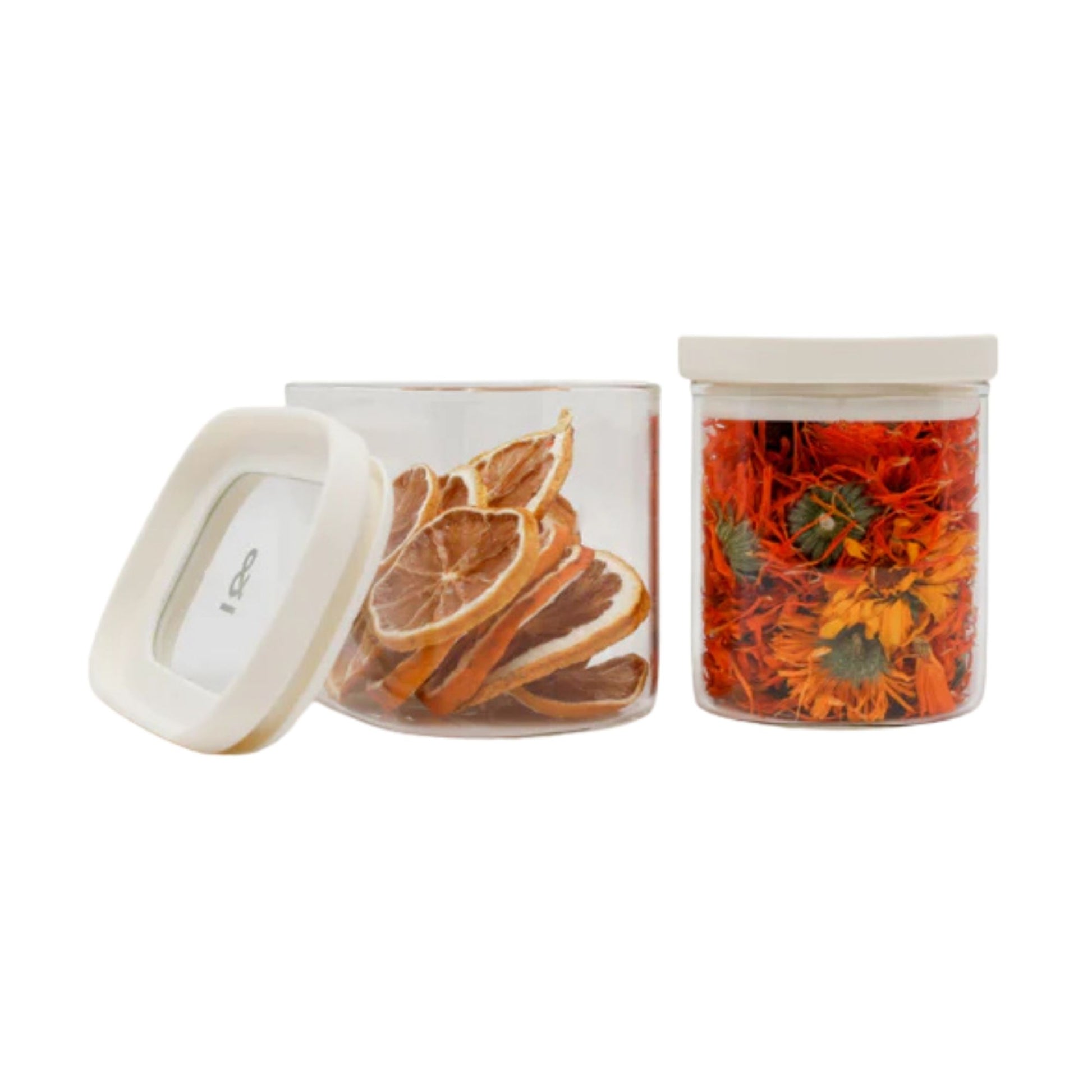 Glassbeholdere med glasslokk fylt med tørket appelsin og blomster, laget av borosilikatglass uten plast i kontakt med maten