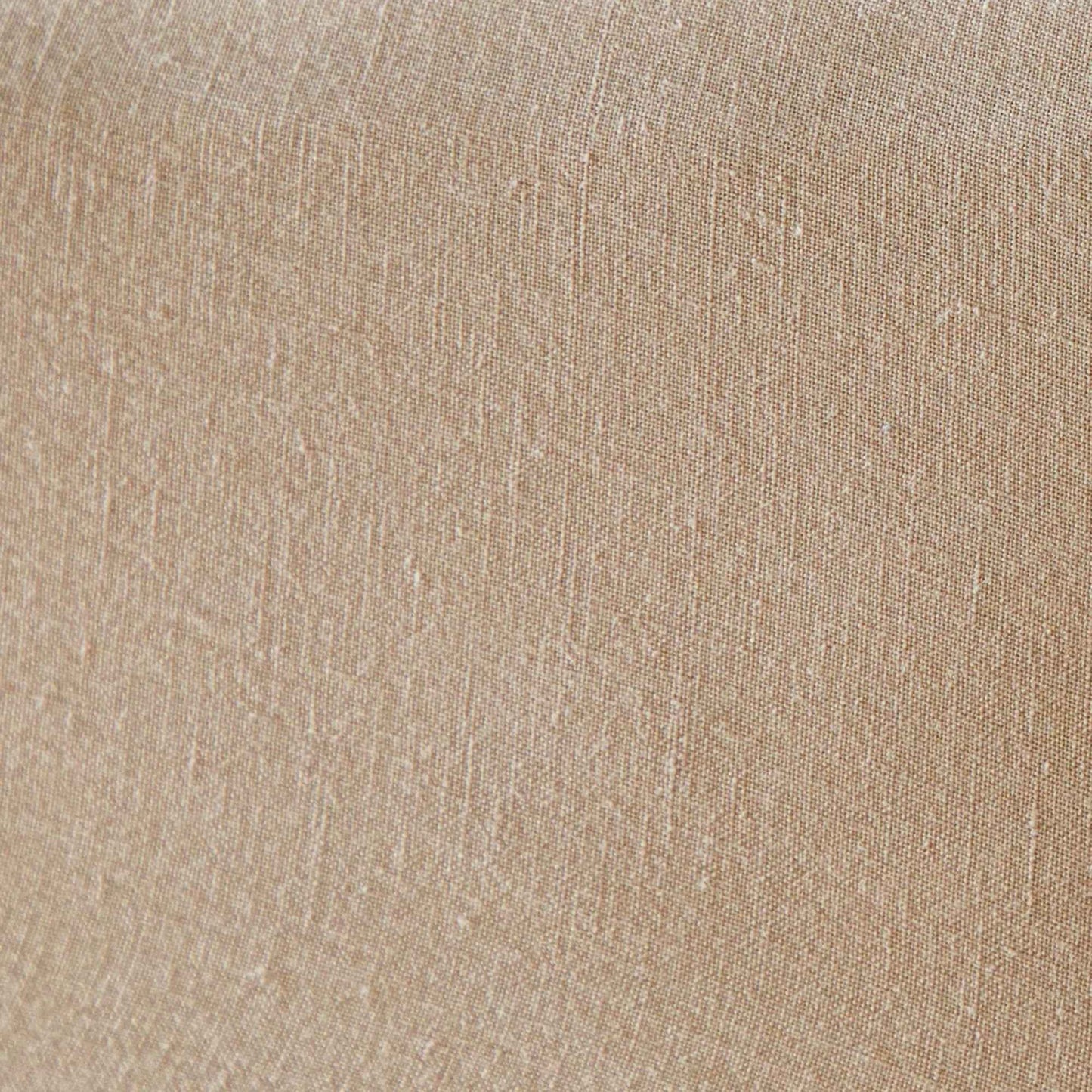 Nærbilde av stoffet i Mariana sengesett, vevd av økologisk bomull og lin med myk og levende struktur