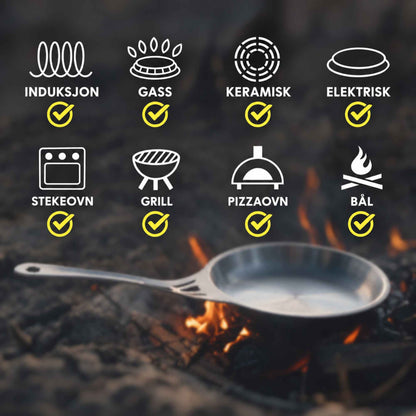 nöni nikkelfri stekepanne som fungerer på induksjon, gass, keramisk og elektrisk koketopp, i stekeovn, på grill, i pizzaovn og over bål.
