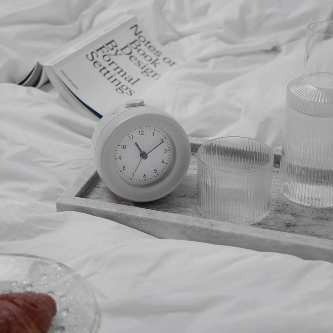Søvnvennlig Mudita Bell sunrise-alarm med gradvis lys og skjermfri design
