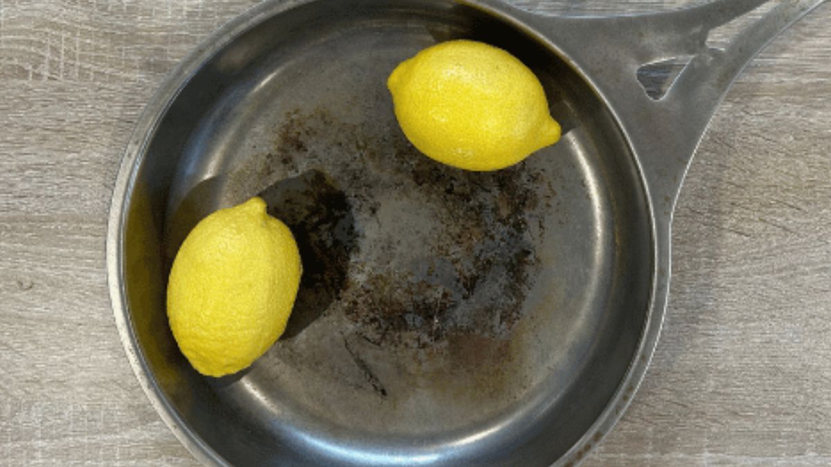 Fastbrent nöni™-panne i rustfritt stål rengjøres naturlig med sitroner