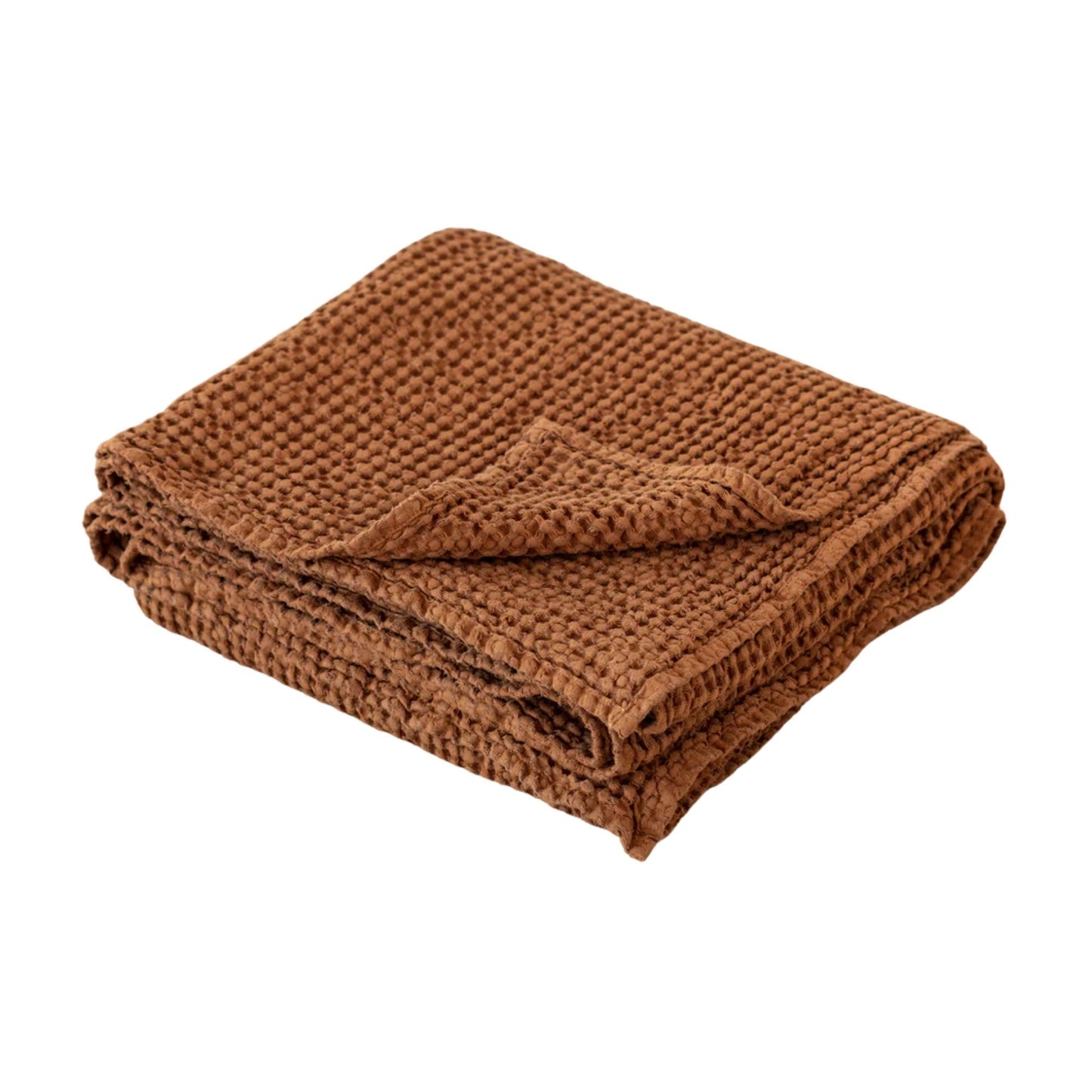 Brettet waffle-pledd i lin og bomull i fargen cinnamon fra MagicLinen, vist på hvit bakgrunn som hovedproduktbilde.